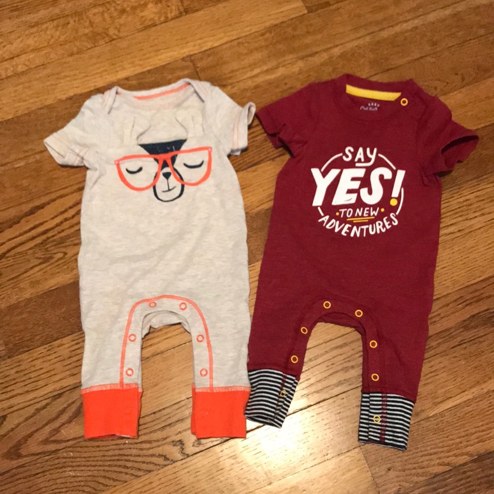 Two NB Cat & Jack short sleeved one piece outfits
